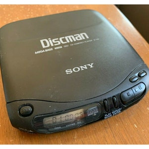 NOS 90s AIWA discman / reproductor de CD portátil con caja original,  auriculares y manuales -  España