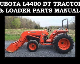 May include: An orange Kubota L4400 DT tractor with a front loader attachment. The tractor is parked on a gravel driveway with trees in the background. The image is a close-up of the tractor and loader.