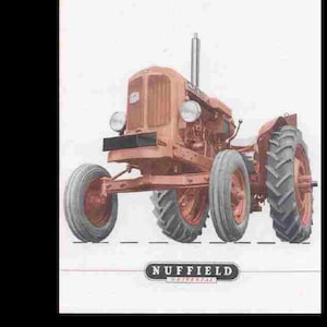 May include: A red tractor with a black Nuffield logo. The tractor has four wheels and a large front grill.