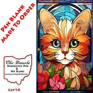 May include: A stained glass style illustration of a cat with orange, yellow, and white fur. The cat has green eyes and is surrounded by pink and green flowers. The image is titled "CAT10" and is a pen blank made to order.