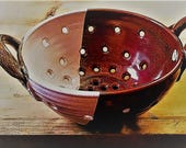 Wattlefield Pottery - Colander or Berry Bowl.  Handmade by Andrea Young.  Stoneware.  White. Iron red glazes.