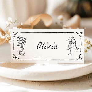 Tarjetas de lugar para bodas, tarjetas de nombre, dibujadas a mano, manuscritas, en blanco y negro, diseño minimalista de asientos, impresas y personalizadas, dobladas.