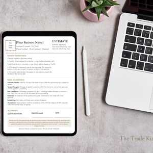 Può includere: Un tablet digitale che mostra un modulo di preventivo con il testo "Your Business Name" e "ESTIMATE". Una penna bianca, un laptop e una piccola pianta in vaso sono visibili su una superficie grigia. The Trade Kit Co. è stampato in basso.