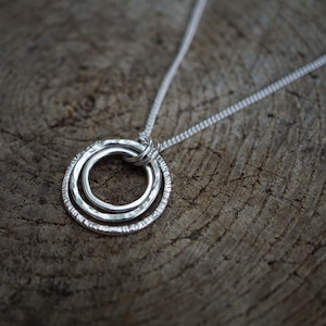 Trio of Hammered Silver Rings Pendant