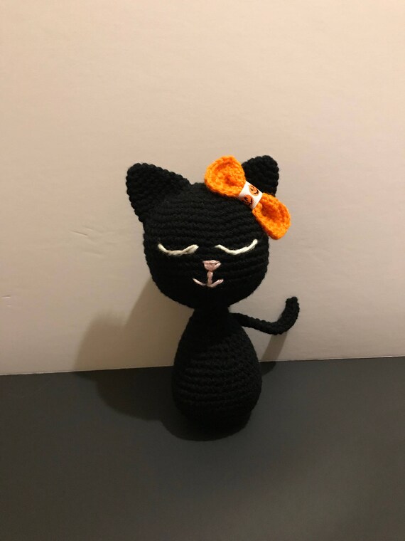 cuddly black cat