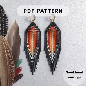 May include: A pair of beaded earrings with a black, orange, red, and white pattern. The earrings have a gold hoop and a fringe design. The text "PDF PATTERN" is at the top, and "Seed bead earrings" is at the bottom.