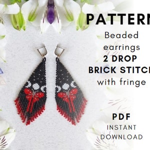 May include: Beaded earrings pattern featuring a black, red and white design. The pattern is for 2 drop brick stitch earrings with fringe. The pattern is a PDF instant download.