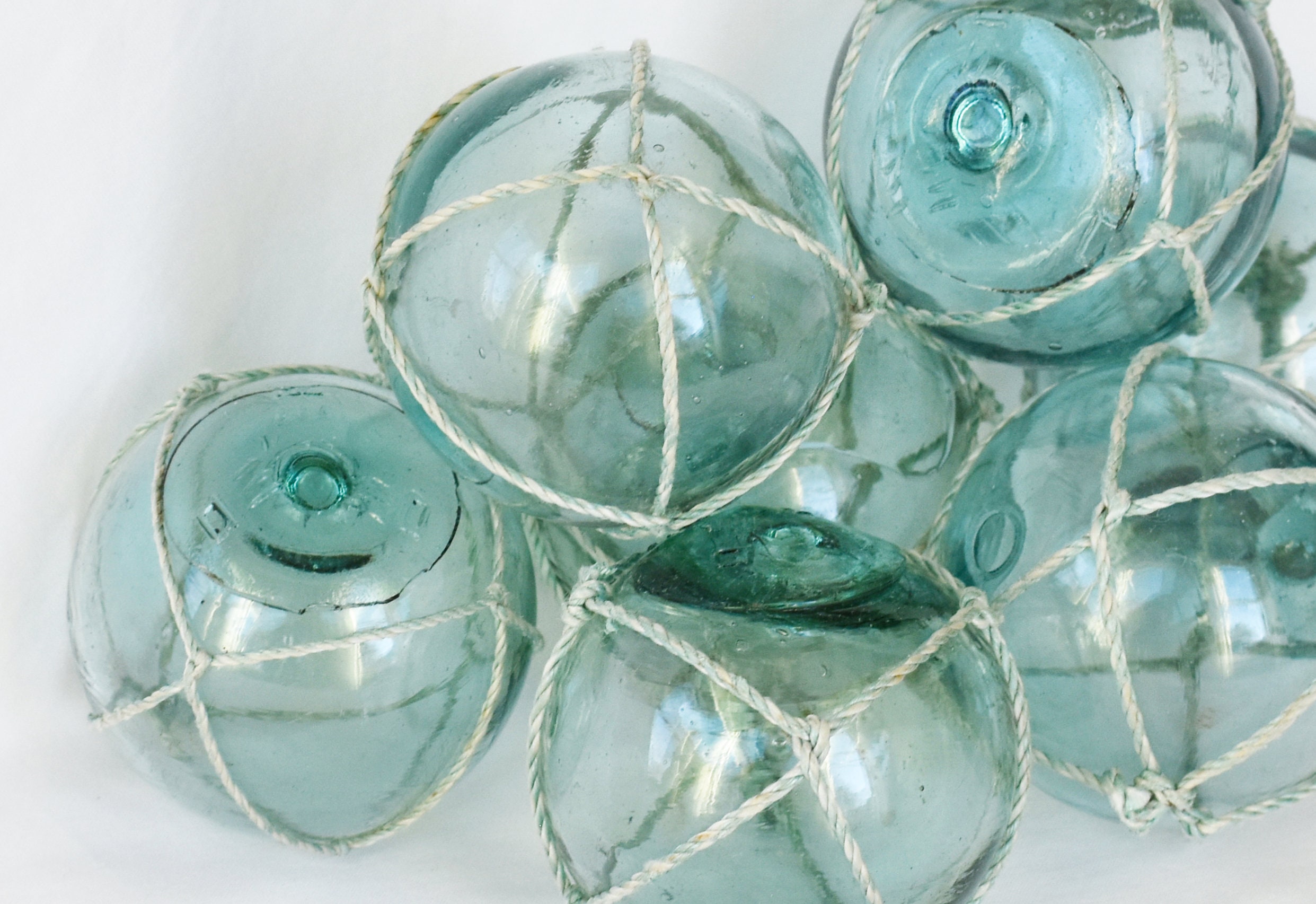 Seven Vintage Japanese Glass Fishing Floats 