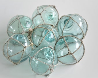 Seven Vintage Japanese Glass Fishing Floats