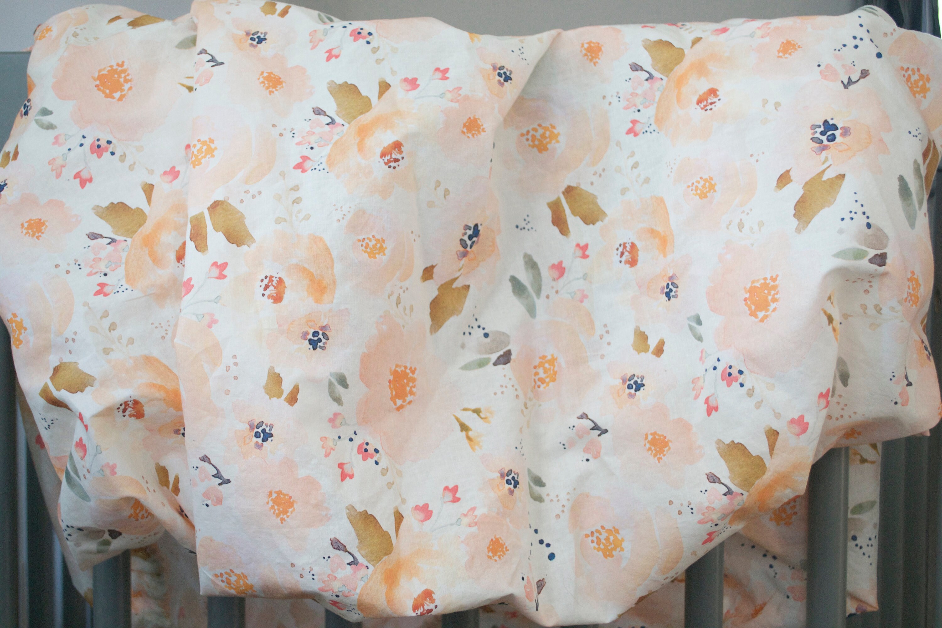 peach floral crib sheet