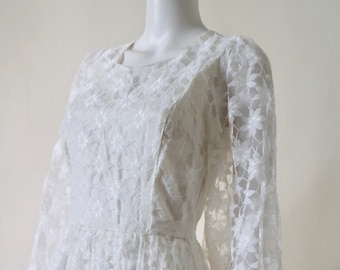 Finnish Vintage Kaisu Heikkilä Bohemian white maxi dress with Queen Anne neckline puff sleeves and lace details 1970s 70s made in Finland
