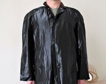 Vintage shiny black PVC-coated cotton rain coat with corduroy collar and press buttons 1960s 60s