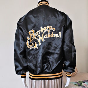 Vintage Barbara Mandrell shiny black satin college bomber jacket with raglan sleeves 1980s 80s made in USA