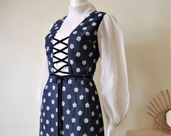 Vintage dark blue floral prairie maxi dress with velvet lace up bib and puff sleeves 1970s 70s