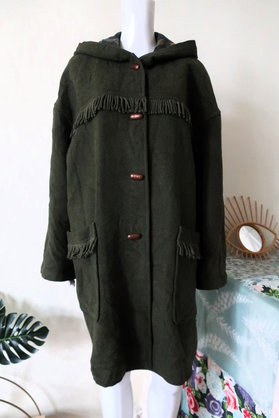 Vintage Geiger Tyrolean trachten loden wool coat parka with fringe details acorn buttons hood and tartan lining 1990s 90s made in Austria