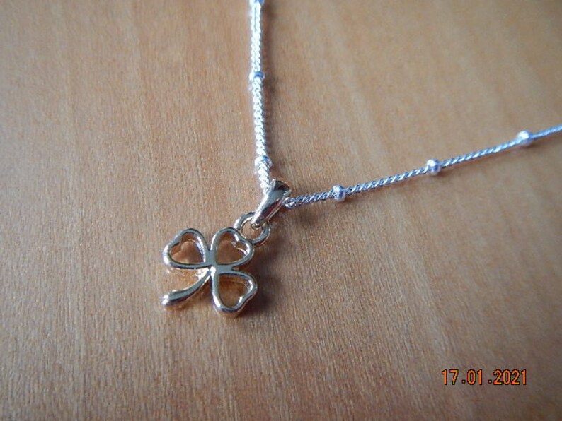 Gold-tone Shamrock Pendant on Silver-tone Necklace