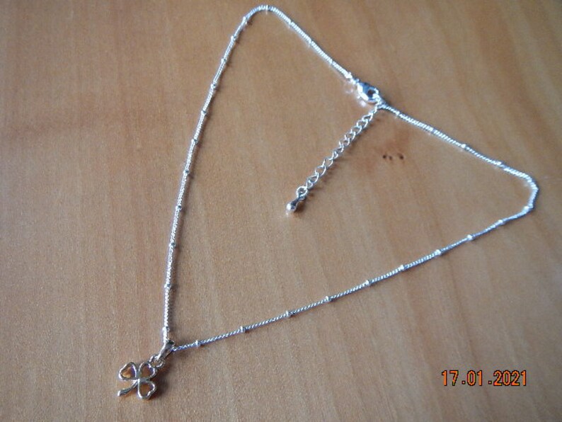 Gold-tone Shamrock Pendant on Silver-tone Necklace