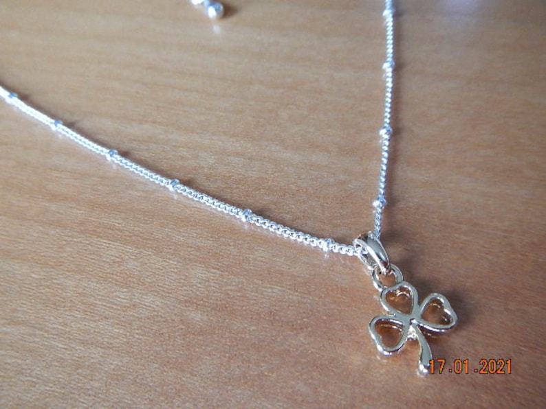 Gold-tone Shamrock Pendant on Silver-tone Necklace