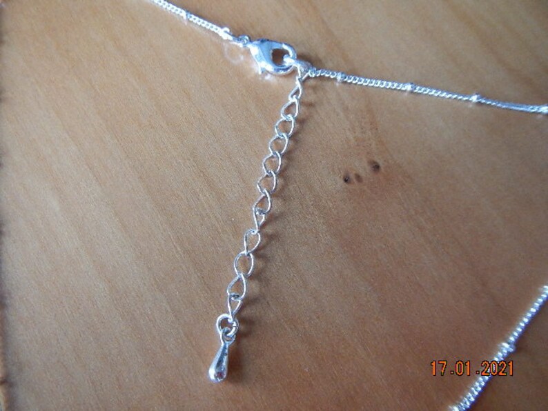 Gold-tone Shamrock Pendant on Silver-tone Necklace