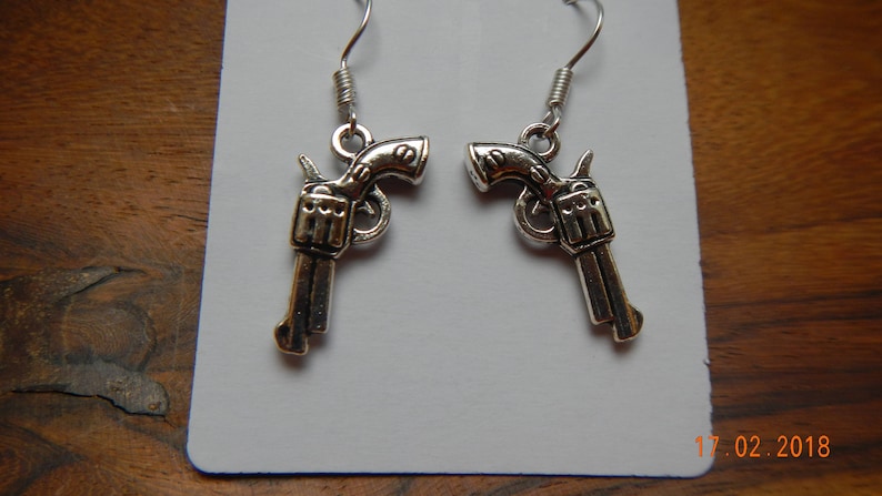 Silver-tone Revolver Dangle Earrings