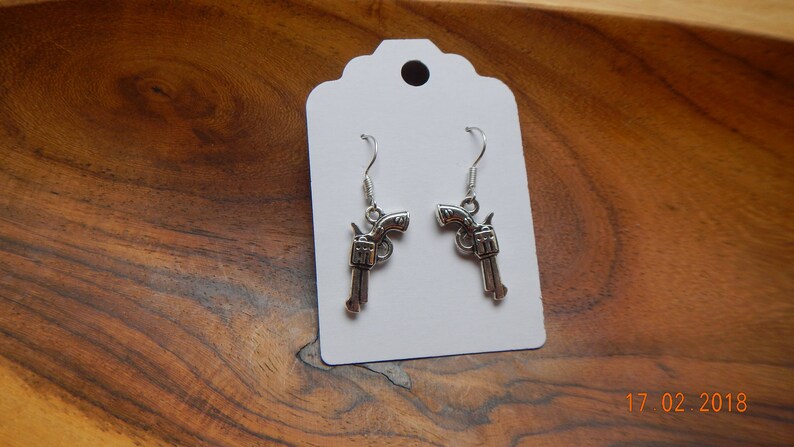 Silver-tone Revolver Dangle Earrings