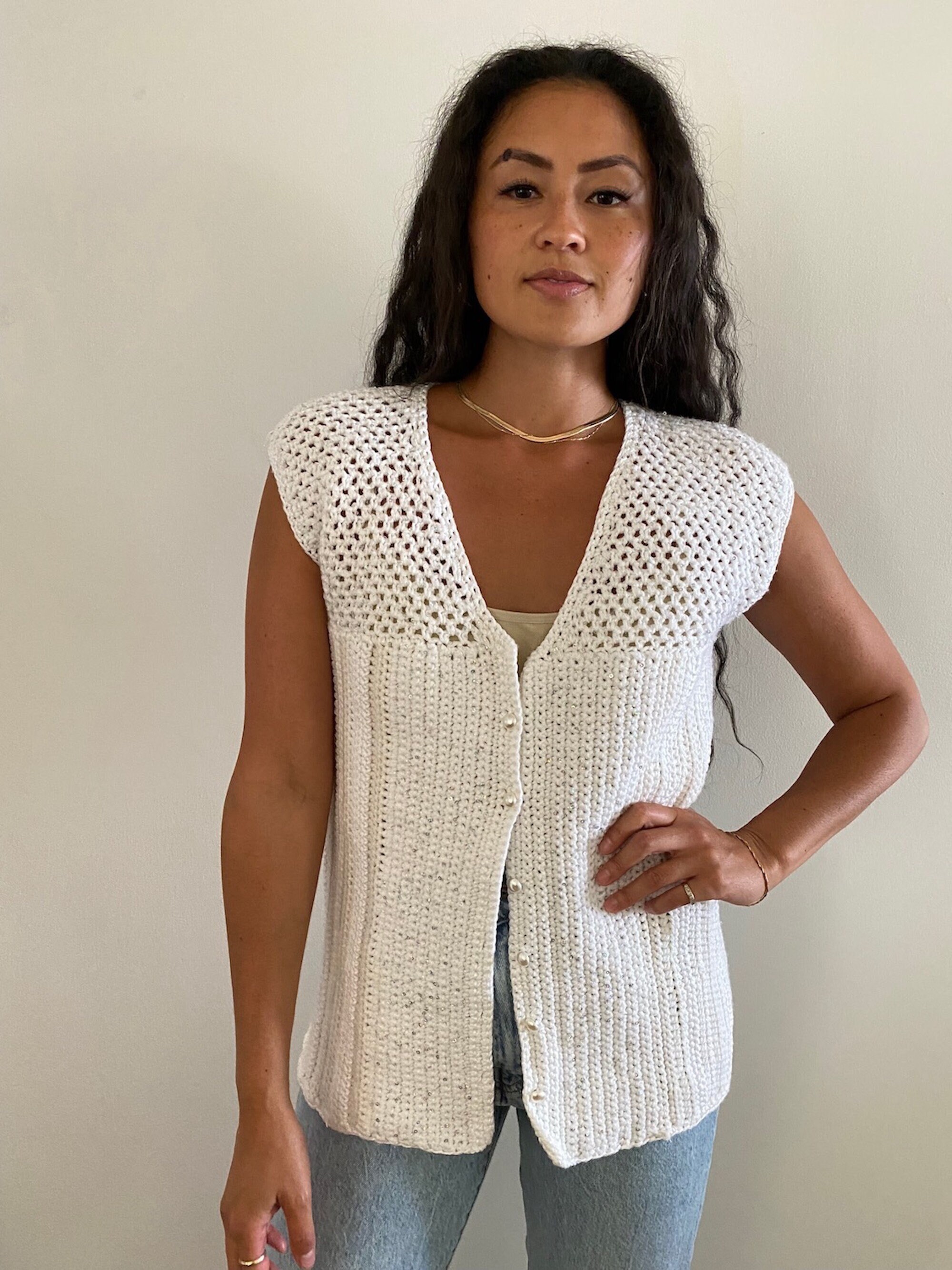 white crochet vest