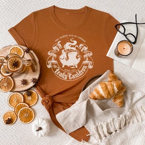 Leaky Cauldron Heather Autumn Colored Shirt // Halloween Wizard Unisex Tee