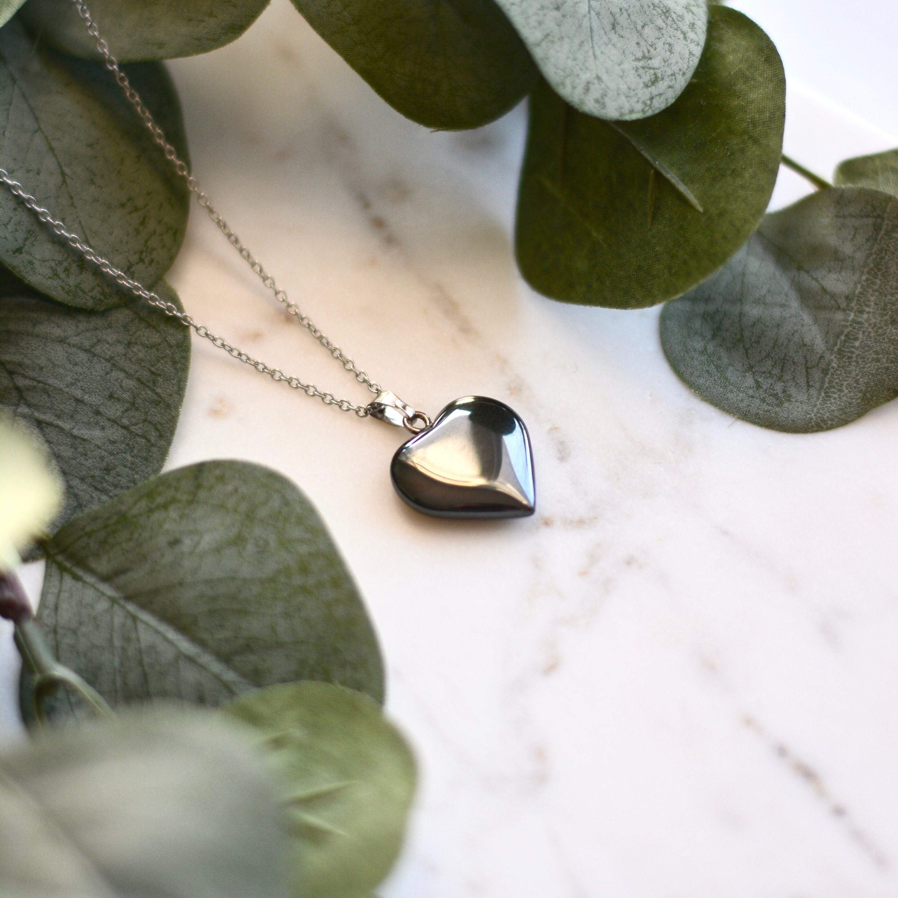 thumbnail image 2 of Hand Carved Natural Hematite Heart-Shaped Pendant - Polished Stone Jewelry, Healing Crystal Gift 2 of 10