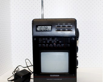 Vintage Citizen Portable B & W TV 5", Radio Combo Am/FM Radio, Clock Alarm  ac/dc 12v Adapter or Battery Operated Nice Condition.