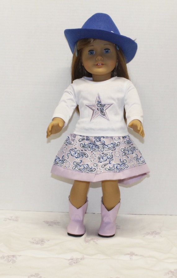 American girl doll with cheap brown hair and blue eyes