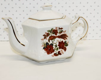 Théière anglaise Ellgreave Wood and Sons vintage, couleurs rouille avec faisan et feuilles vertes Théière à six faces, bordure dorée, peut contenir 2 1/4 tasses