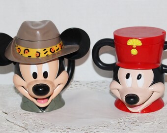 Pair of Vintage Walt Disney on Ice Collector Cups, Mugs, Flip Lid, Mickey Leader of the Band & Mickey Safari