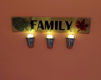 Handcrafted Wall Sign with flameless candles.