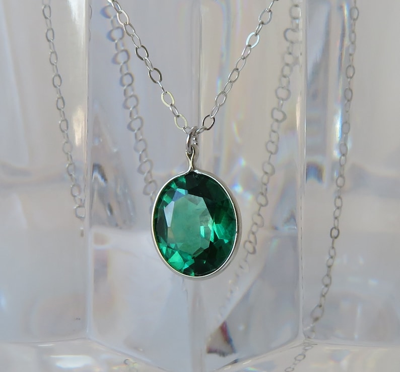 Oval Emerald Pendant on Silver Chain