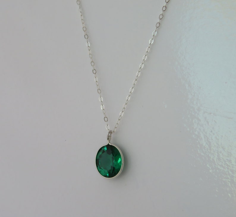 Oval Emerald Pendant on Silver Chain