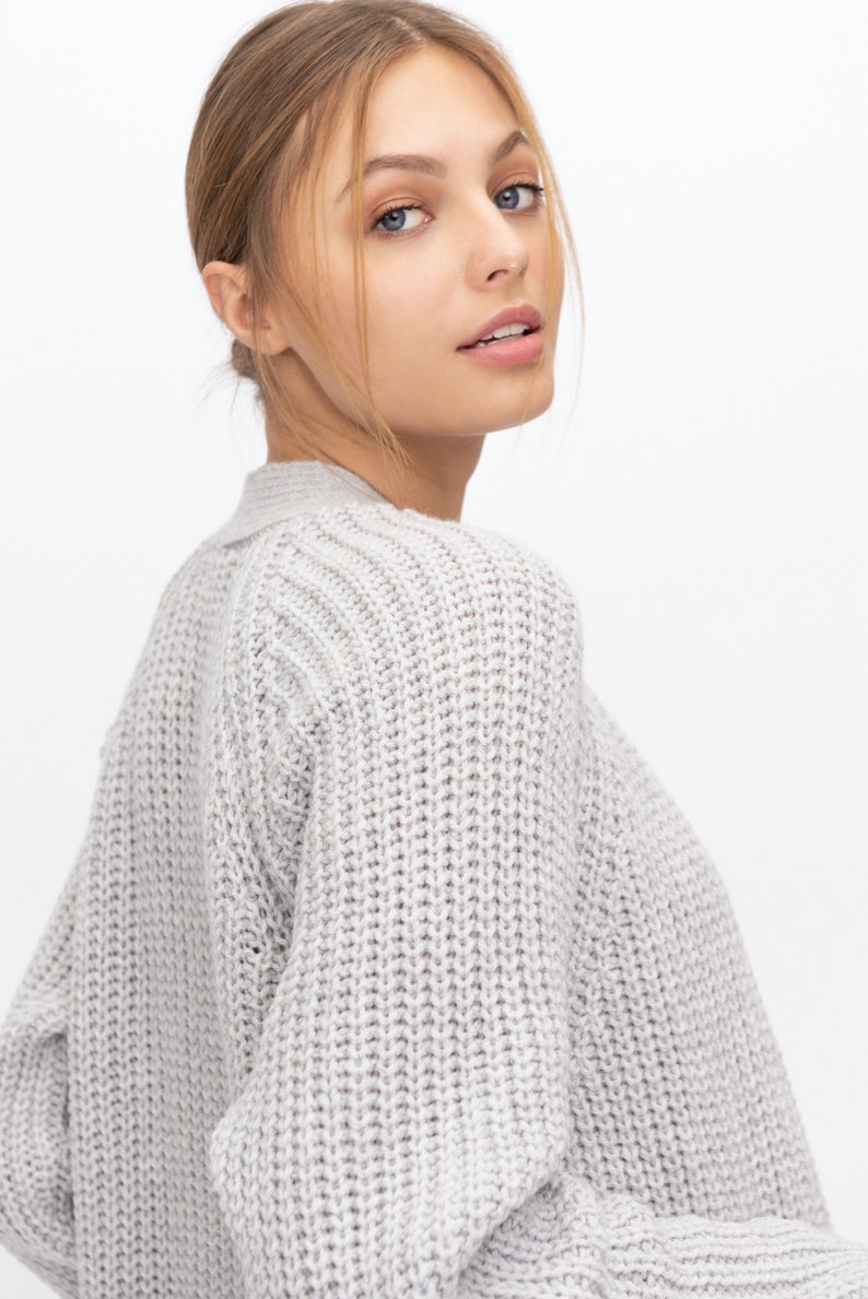 black knitted polo neck jumper