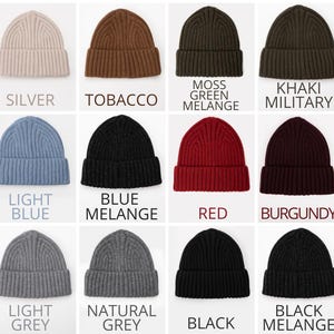 May include: A collection of twelve ribbed knit beanies in various colors including silver, tobacco, moss green melange, khaki military, light blue, blue melange, red, burgundy, light grey, natural grey, black, and black melange with labels.