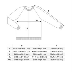 Puede incluir: Una tabla de tallas para un su&eacute;ter con medidas en pulgadas y cent&iacute;metros. La tabla muestra el ancho, la altura y la longitud de la manga para las tallas S, M, L, XL y XXL.