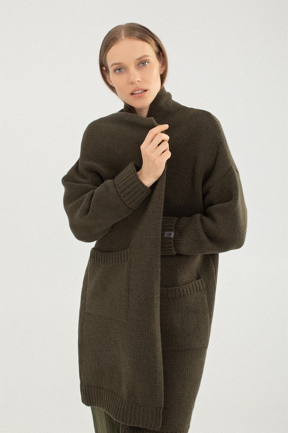 A woollen front open knitted jacket store