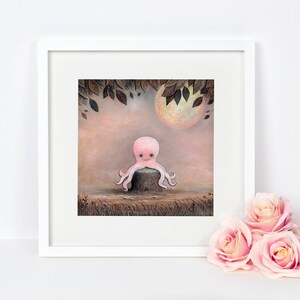 May include: A framed illustration of a pink octopus sitting on a tree stump in a forest setting. The octopus has a friendly expression and is surrounded by leaves and a large, glowing moon.