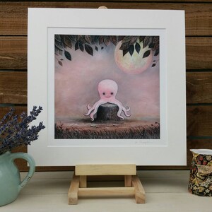May include: A pink octopus sitting on a tree stump in a whimsical forest setting. The octopus has a friendly face and is surrounded by leaves and a full moon.