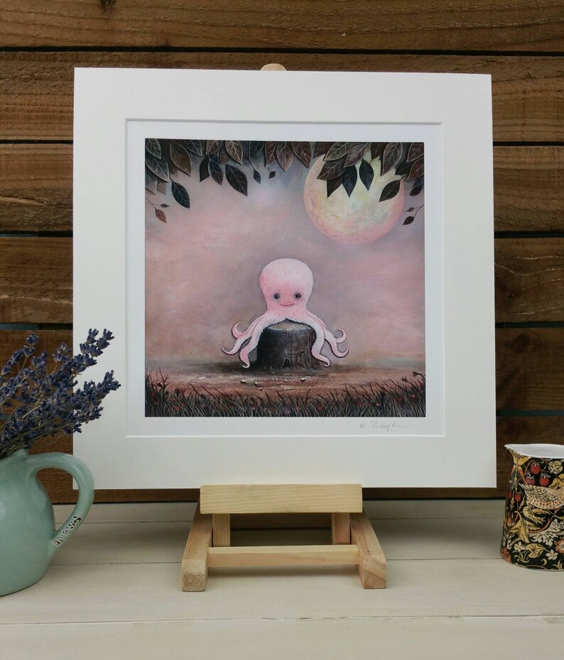May include: A pink octopus sitting on a tree stump in a whimsical forest setting. The octopus has a friendly face and is surrounded by leaves and a full moon.