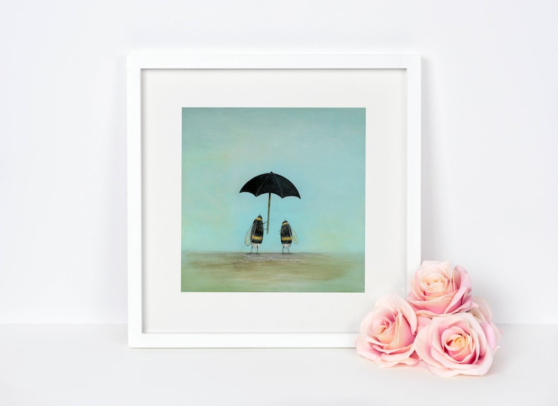 May include: A framed painting of two bumblebees standing under a black umbrella on a light blue background.
