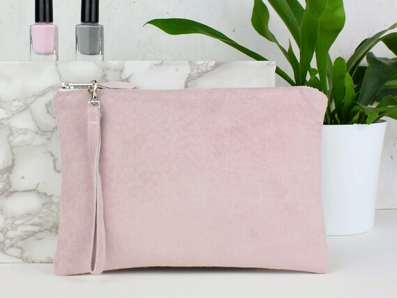 pink suede clutch bag