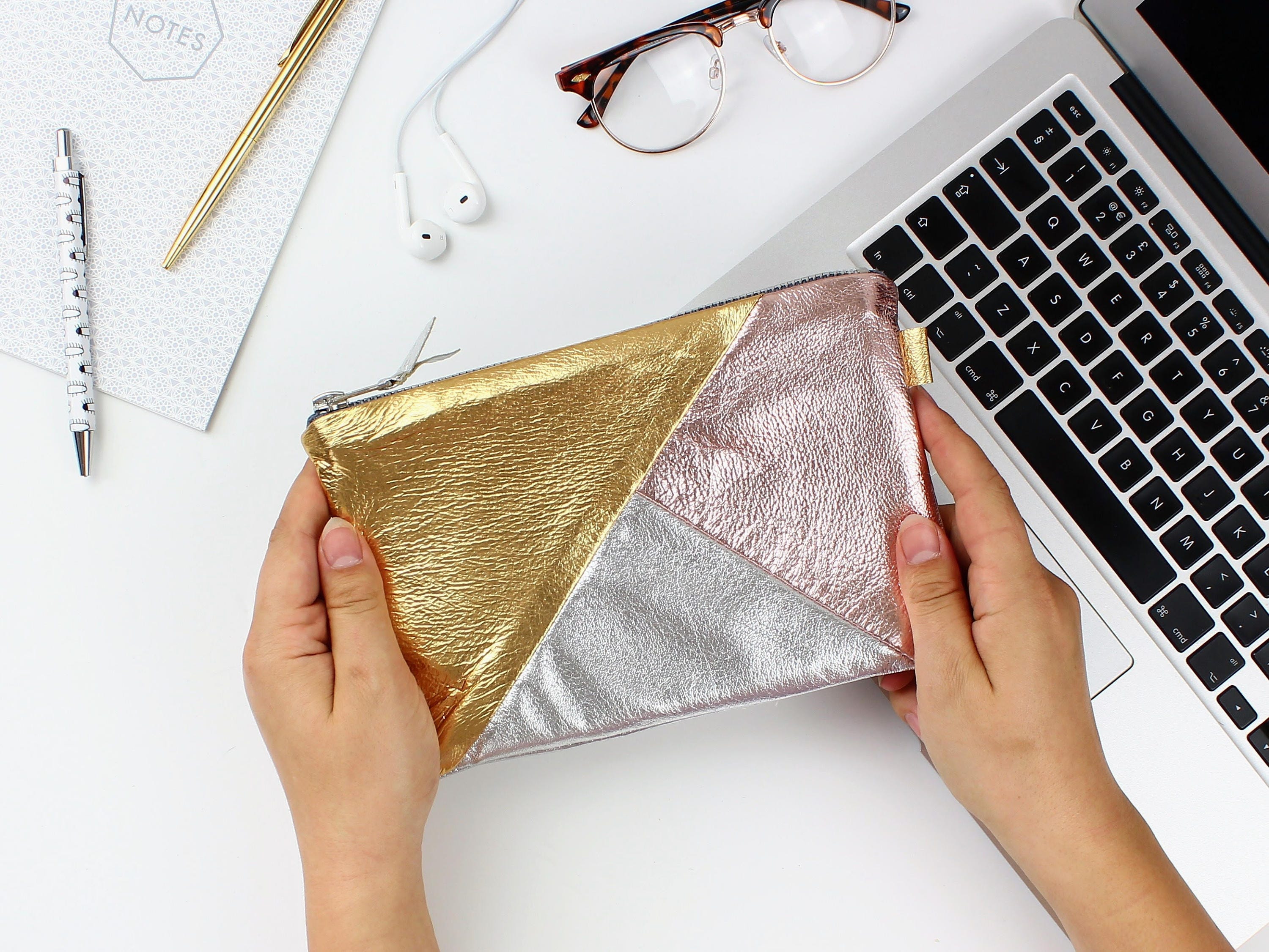 rose gold and silver clutch bag