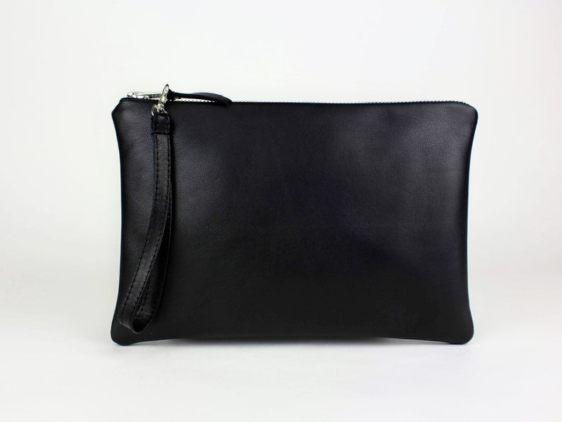 small leather clutch bag
