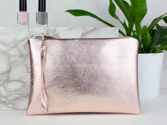 large rose gold clutch bag