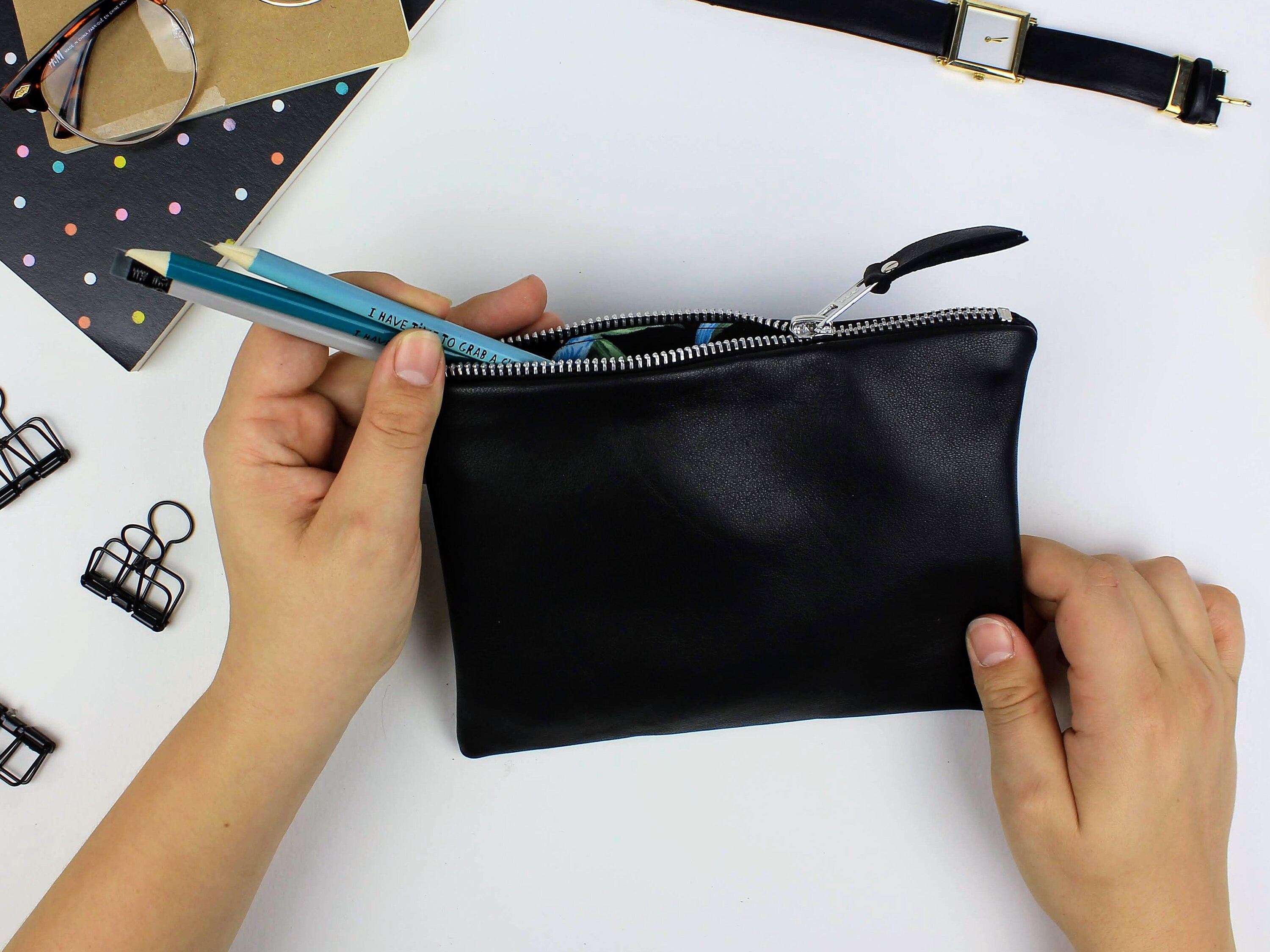 small black zipper pouch
