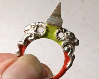 Silver Rams head ring with Acid green and red enamel