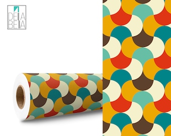 May include: A roll of wrapping paper with a repeating pattern of colorful, overlapping semi-circles in shades of red, orange, yellow, brown, and teal.